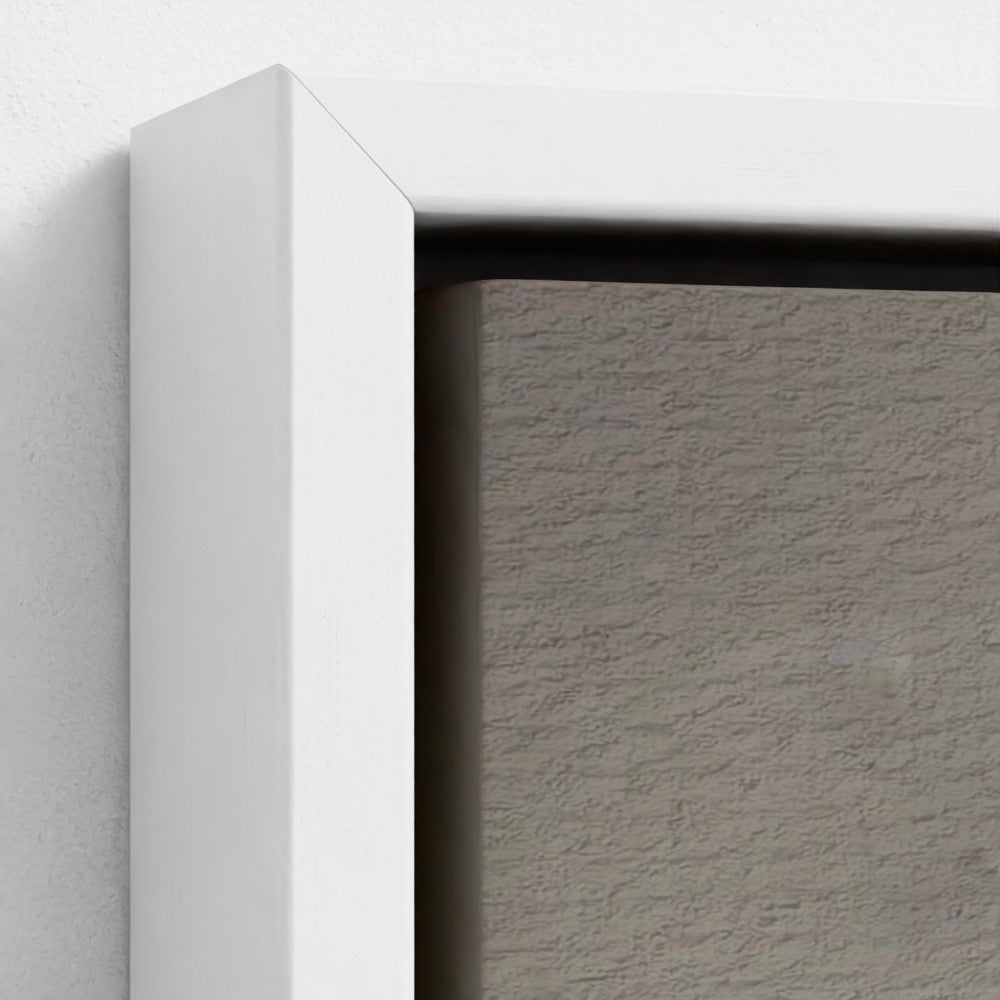 Close-up of a white frame corner with a textured gray background