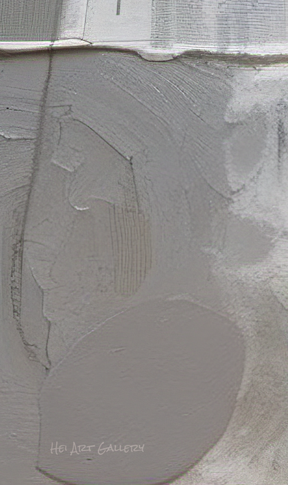 Close-up of a textured gray surface with a visible brand name.