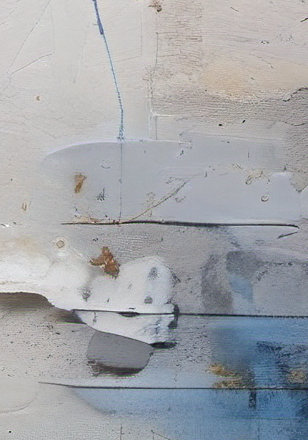 Close-up of a damaged car surface with paint peeling off