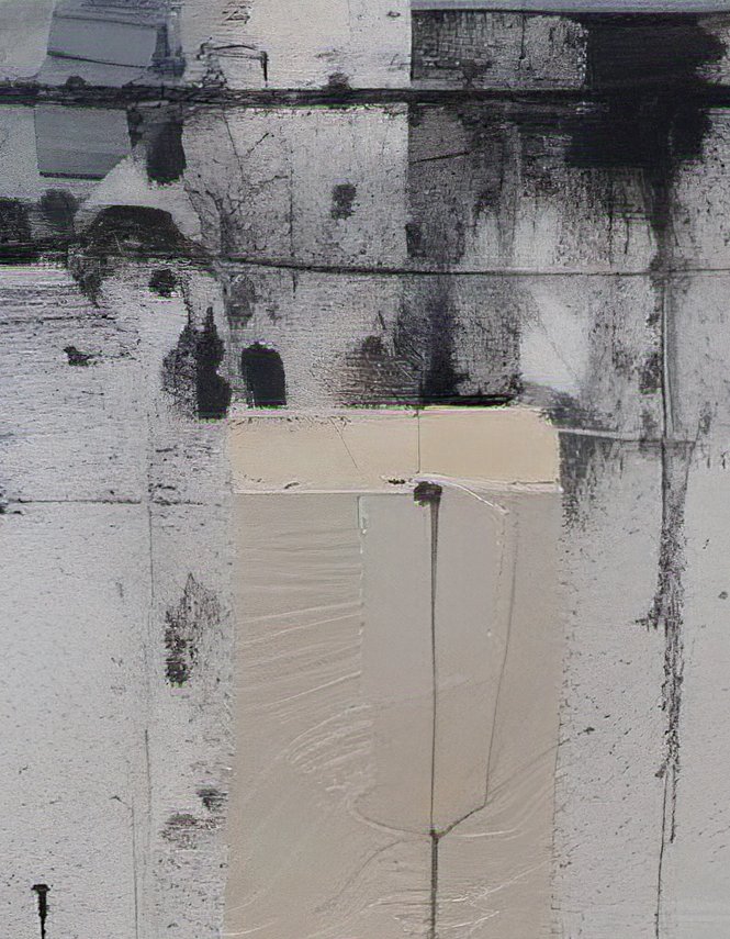 Close-up of a textured wall with a rectangular beige object on a black and white background