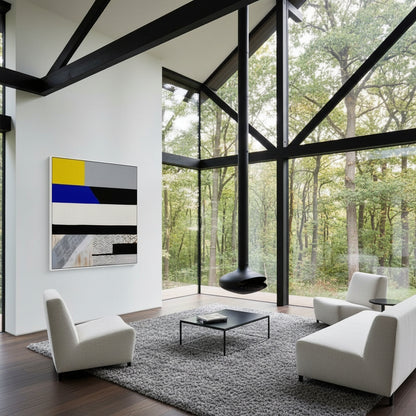 Modern living room with large windows, white furniture, and a abstract painting.