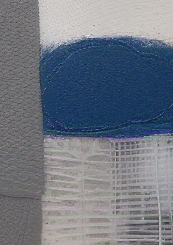 Close-up of a textured surface with blue and gray patterns