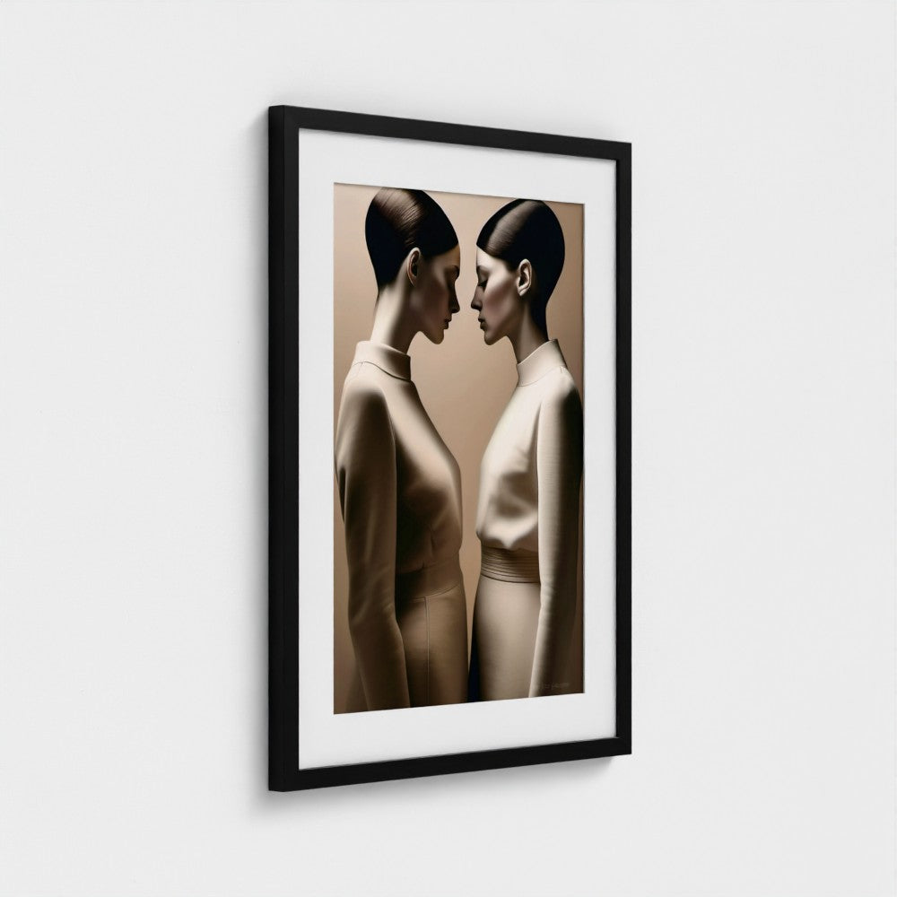 Framed artwork of two women facing each other on a white wall
