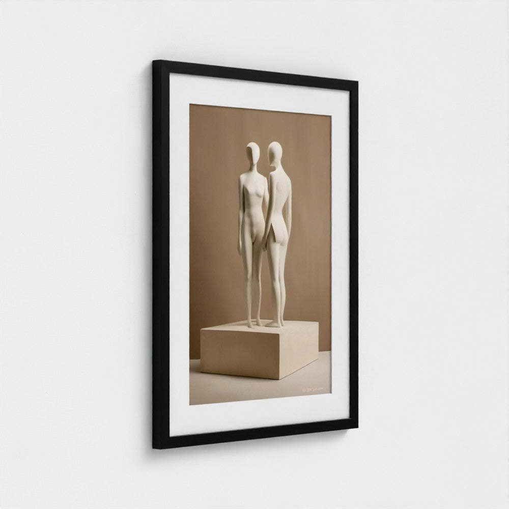 Framed artwork of two abstract sculptures on a beige background