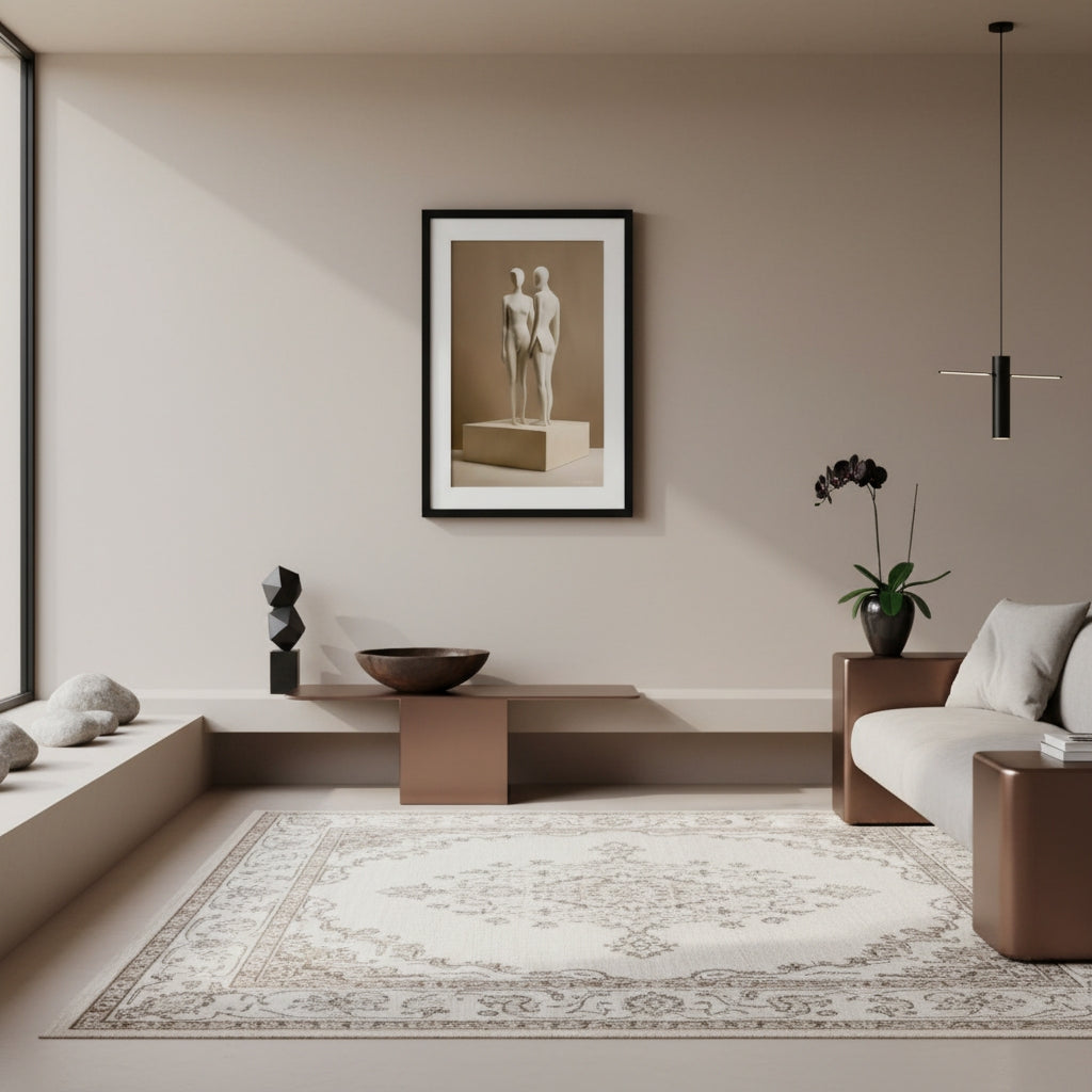 Modern living room with a neutral color palette, featuring a framed artwork on the wall.