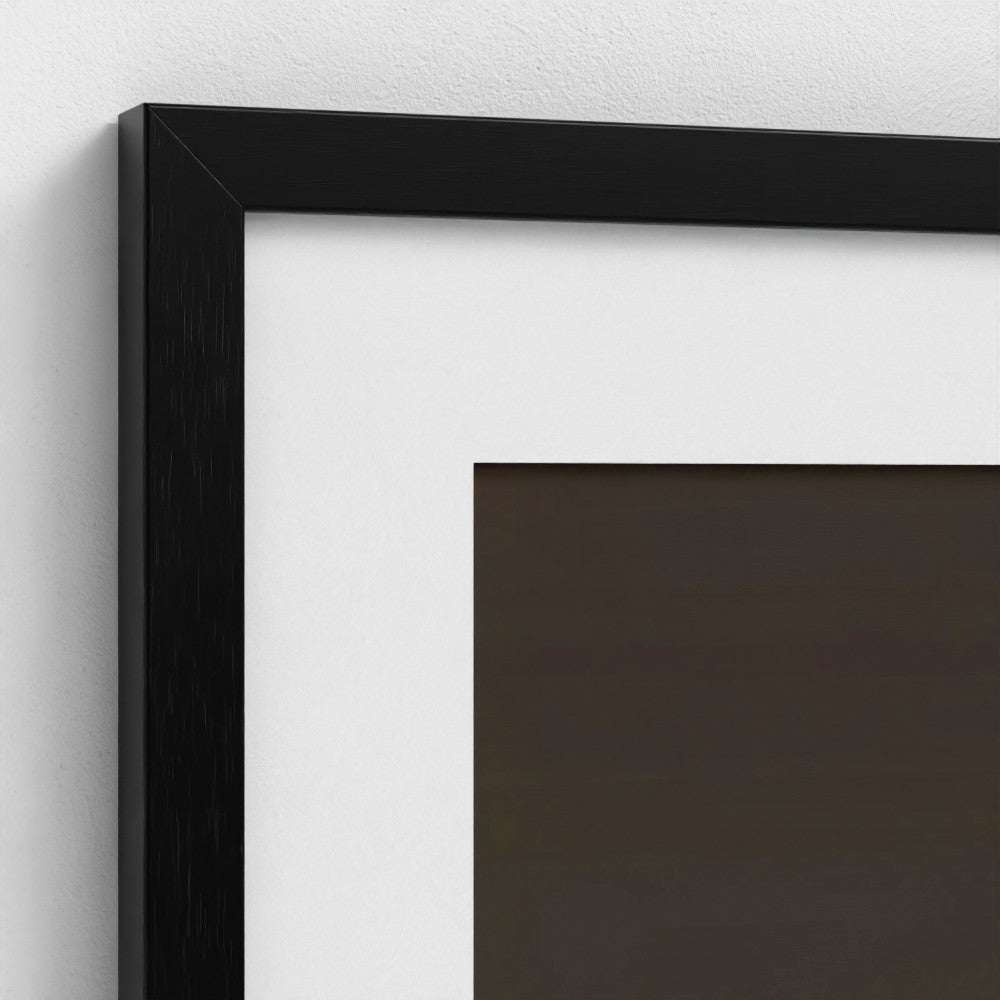 Close-up of a black picture frame on a white wall