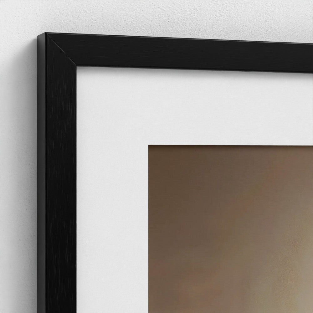 Close-up of a black picture frame on a white wall
