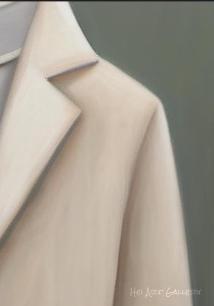 Close-up of a beige coat with a blurred background