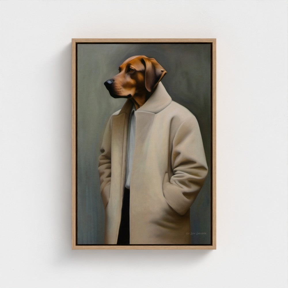 Framed artwork of a dog wearing a coat on a white wall