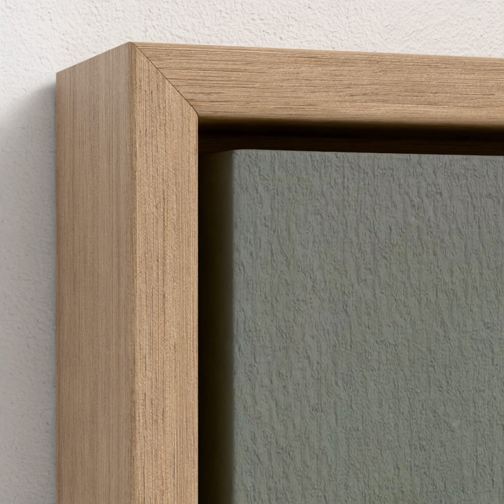 Close-up of a wooden frame corner on a gray wall