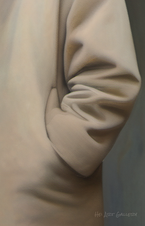 Close-up of beige fabric with folds on a neutral background