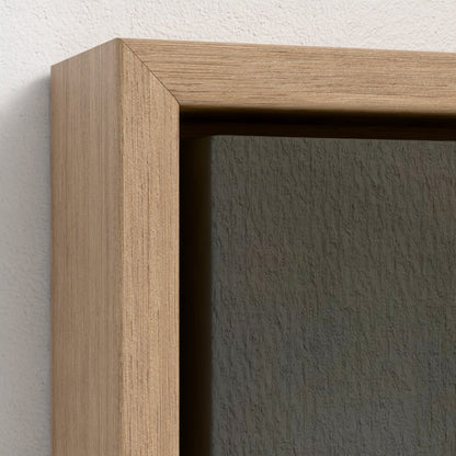 Close-up of a wooden frame corner on a white wall