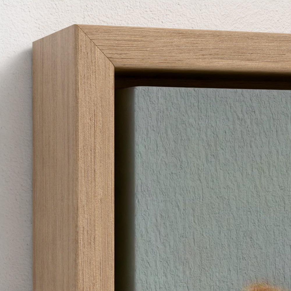 Close-up of a wooden picture frame on a textured wall.