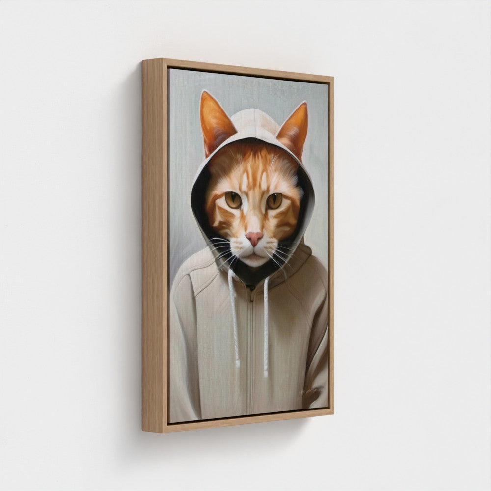 Framed artwork of a cat wearing a hoodie on a white background