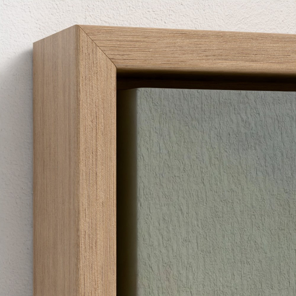 Close-up of a wooden frame corner on a textured wall.