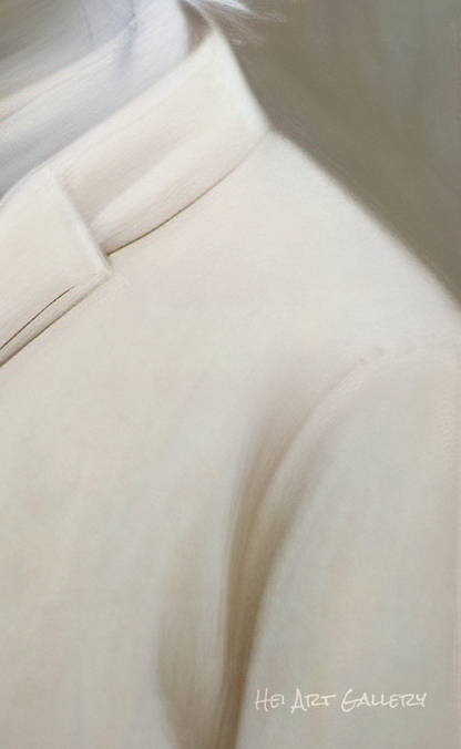 Close-up of a beige suit jacket with a blurred background