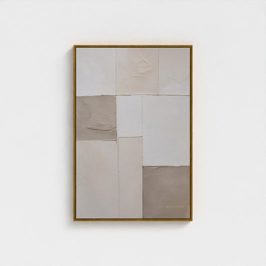 Abstract art piece with geometric shapes in neutral colors on a white wall.