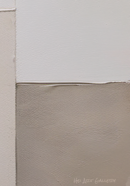 Close-up of a textured wall with different shades of gray.