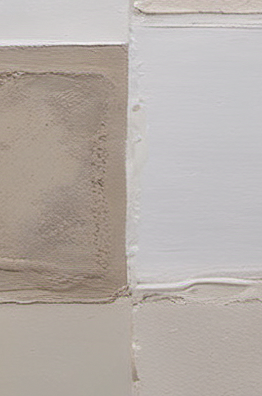 Close-up of textured tiles in neutral colors