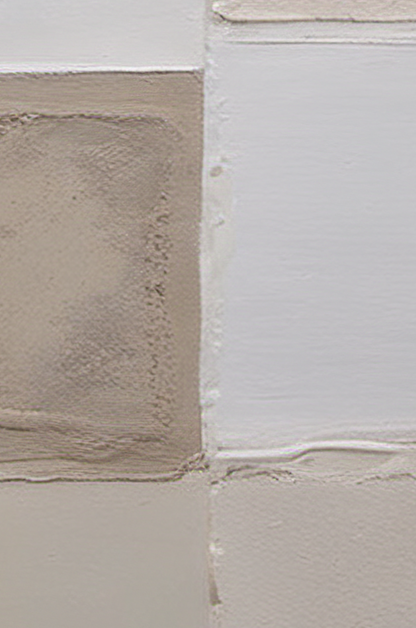 Close-up of textured tiles in neutral colors