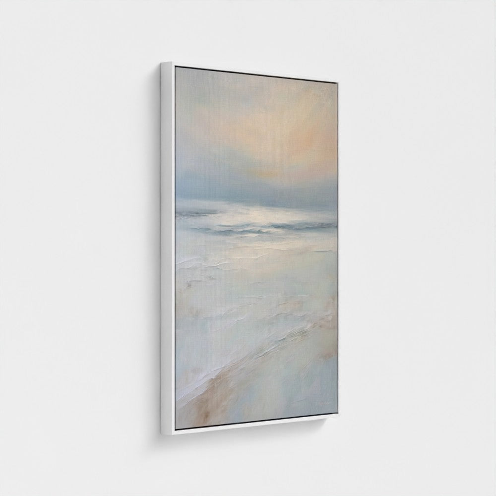 Framed artwork of a beach scene with a sunset on a white background