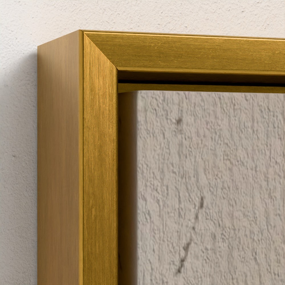 Gold picture frame corner on a textured wall
