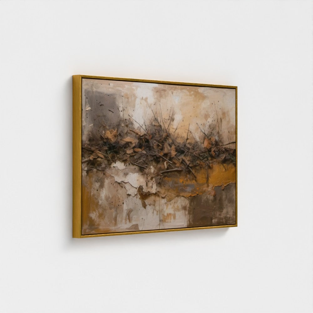 Abstract painting with gold frame on a white wall