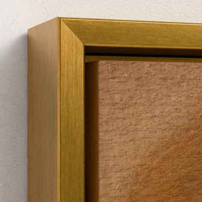 Close-up of a gold picture frame corner on a textured wall.