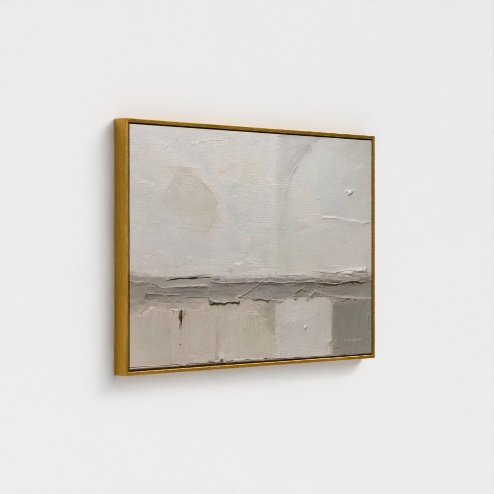 Abstract painting with a gold frame on a white wall