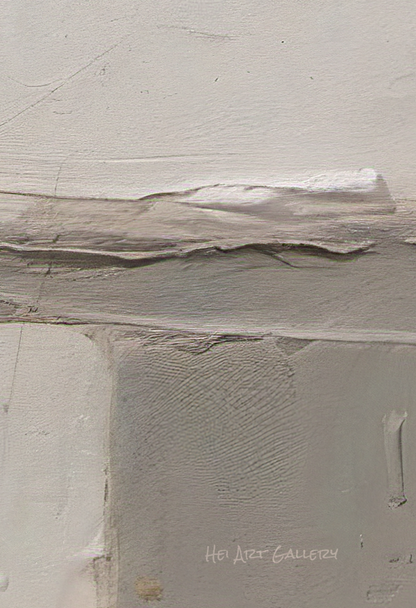 Textured gray surface with brush strokes and a visible brand name.