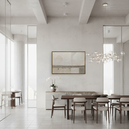 Modern dining room with a long wooden table and chairs, white walls, and a chandelier.
