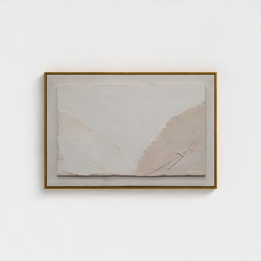 Framed abstract art piece on a white wall