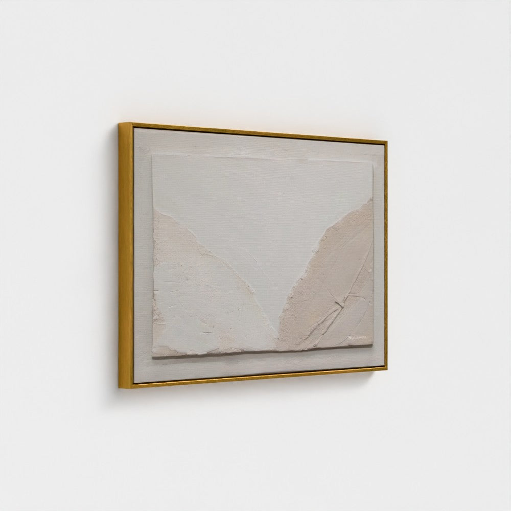 Framed abstract art piece on a white wall