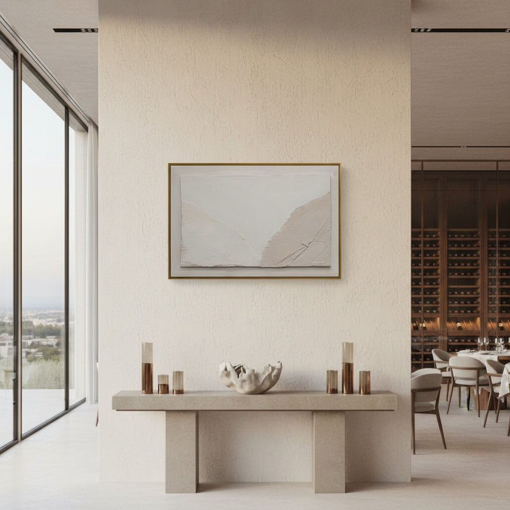 Modern interior with a concrete console table and abstract art on the wall.