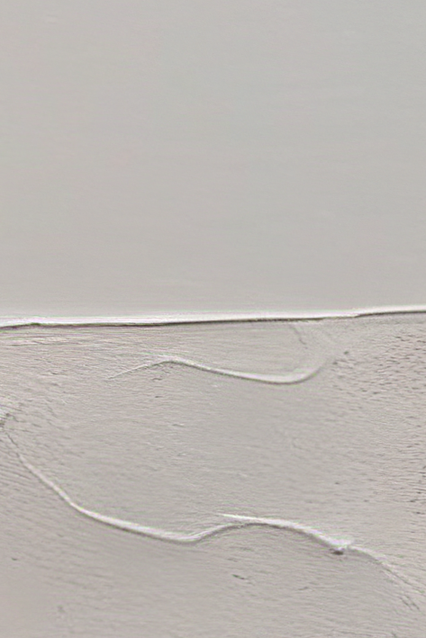 Close-up of a textured gray surface with a horizontal line.