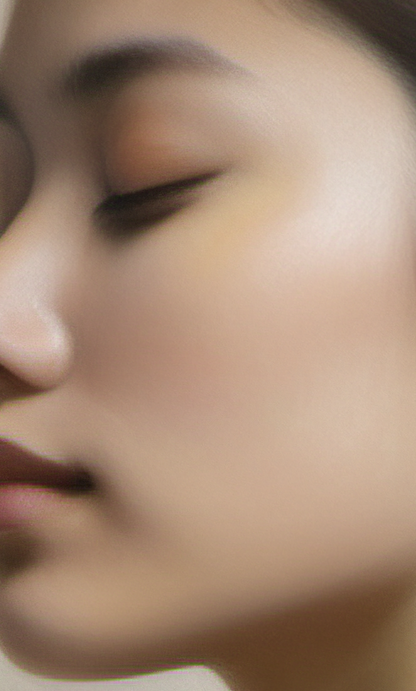 Close-up of a person's face with a blurred background