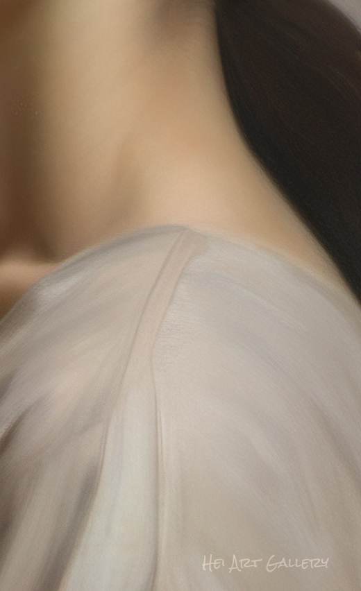 Close-up of a person wearing a sheer beige top with a blurred background