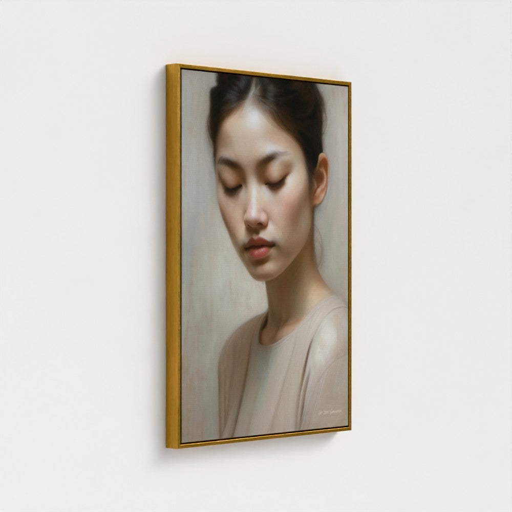 Framed portrait of a woman on a white wall