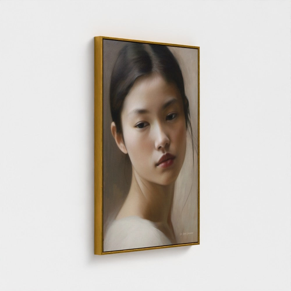 Framed portrait of a woman on a white wall