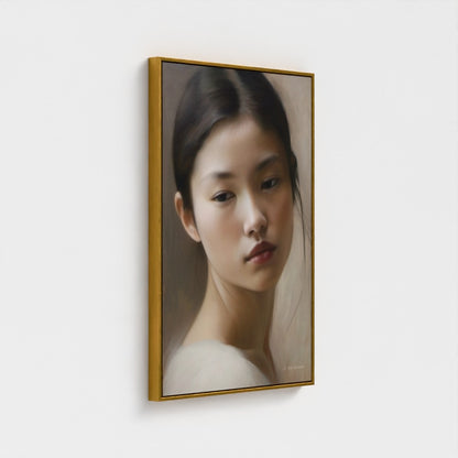 Framed portrait of a woman on a white wall