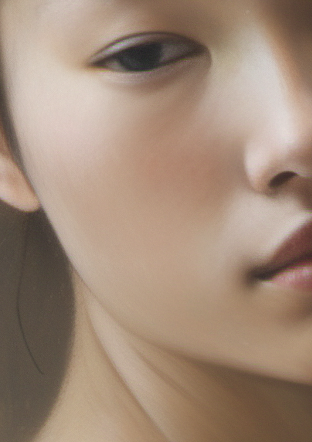 Close-up of a person's face with a neutral expression