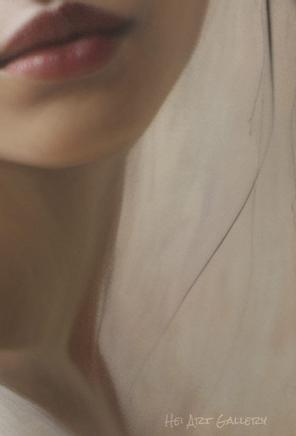 Close-up of a person's face with a soft focus on the hair and skin.