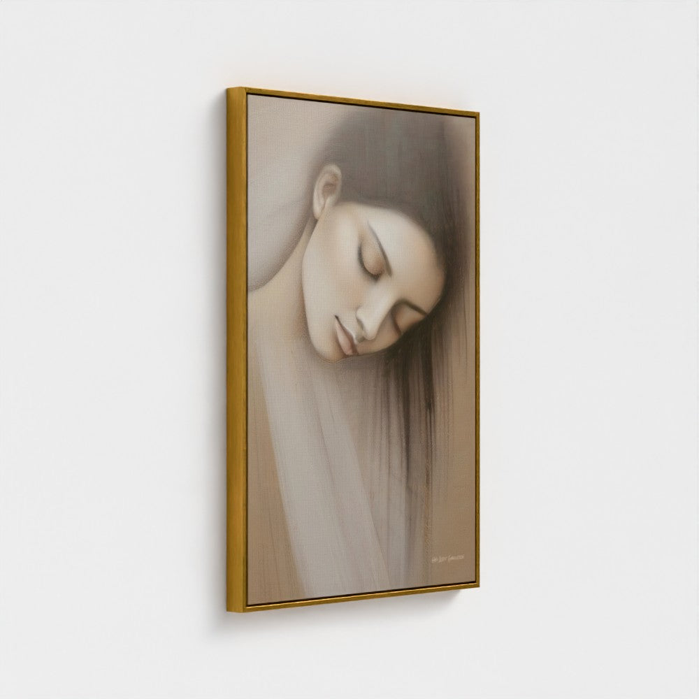 Framed artwork of a woman's face with a gold frame on a white background