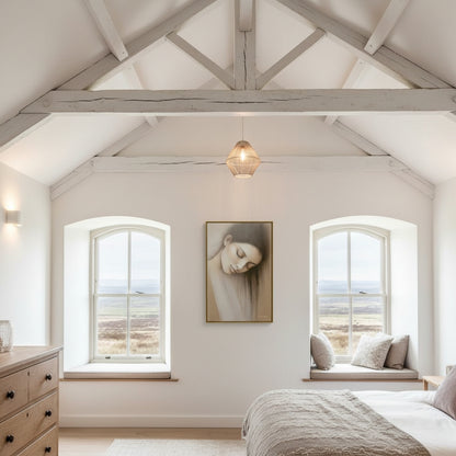 Nestled bedroom with vaulted ceiling, large windows, and a painting on the wall.