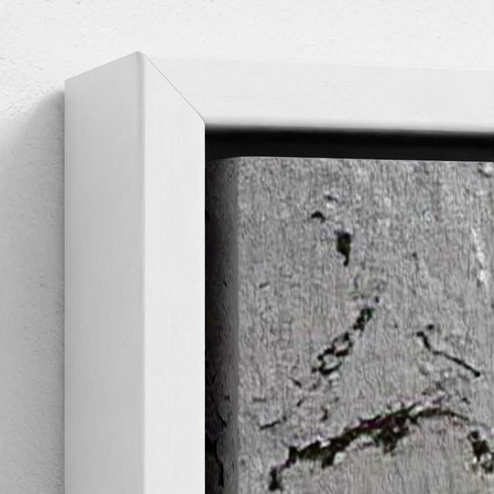 Close-up of a textured surface with a white frame