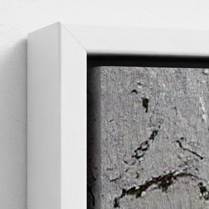 Close-up of a textured surface with a white frame