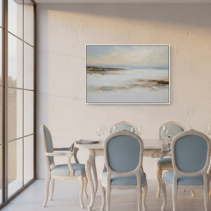 Dining room with a round table and chairs, featuring a large abstract painting on the wall.