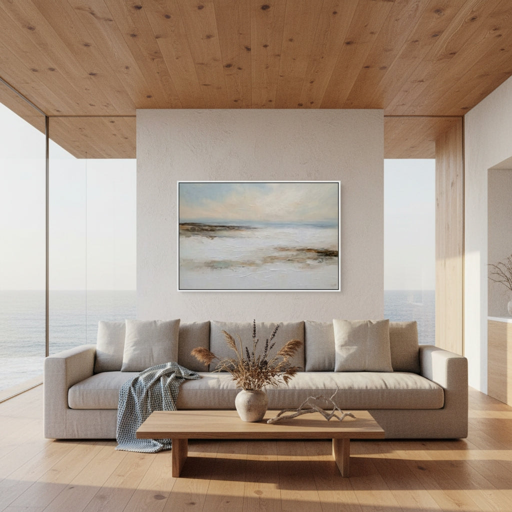 Modern living room with a sofa, coffee table, and abstract painting on a wall.