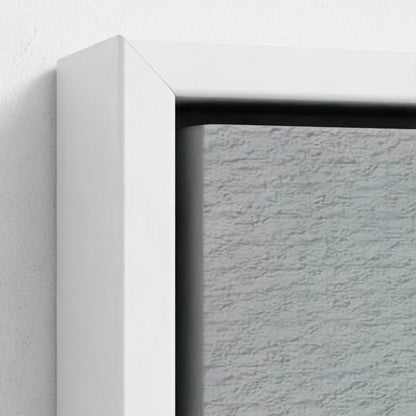 Close-up of a textured wall with a white frame corner.