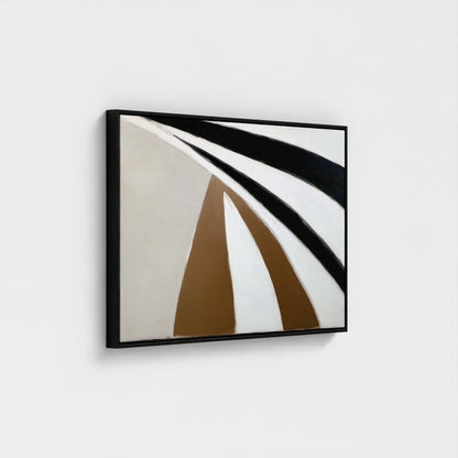 Abstract art piece with geometric design on a white wall